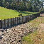 You can see the remnants of the old seawall still sticking out of the ground.