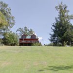 Toledo Bend Cabin looking so pretty up there on the hill.