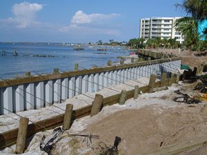 seawall support pilings connected with tension cables