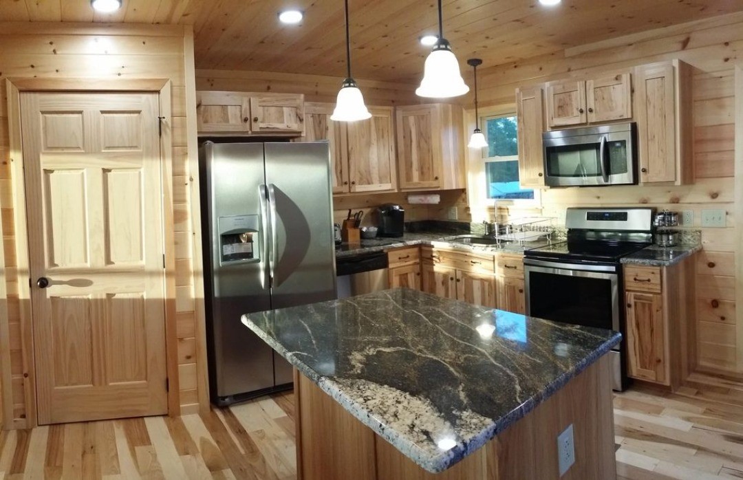 The kitchen at the Toledo Bend cabin is nicely appointed with the same amenities you'll find at home. In the closet to the left is a stackable washer and dryer in case you need to wash something while you're there.

#ToledoBend #ToledoBendCabin #ToledoBendCabins