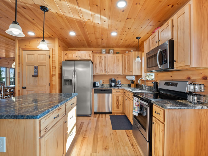 Just the right amount of shelving and workspace in the kitchen area.